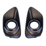 Two dark Compass fog-light surrounds with round openings and tall tapered upper faces