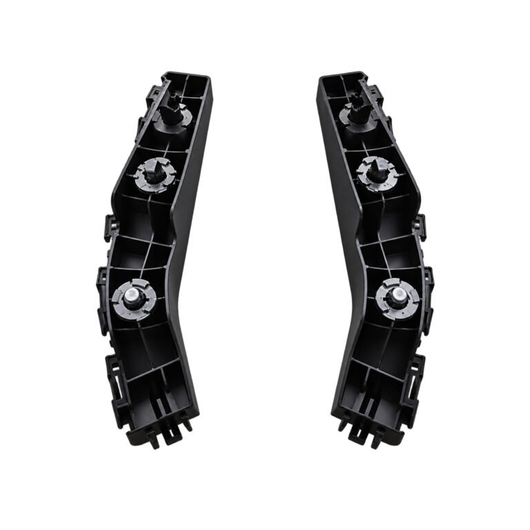 Two Compass front bumper side supports showing curved ribbed backs and circular fixing areas