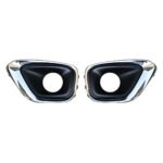 Two Compass fog-light surrounds with bright outer borders, dark recessed faces and round openings