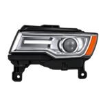 Grand Cherokee adaptive HID headlight with a chrome inner face, circular projector and two lower mounting feet