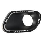 Cherokee fog-light surround with a large offset circular opening and fixing slots around its rounded rim