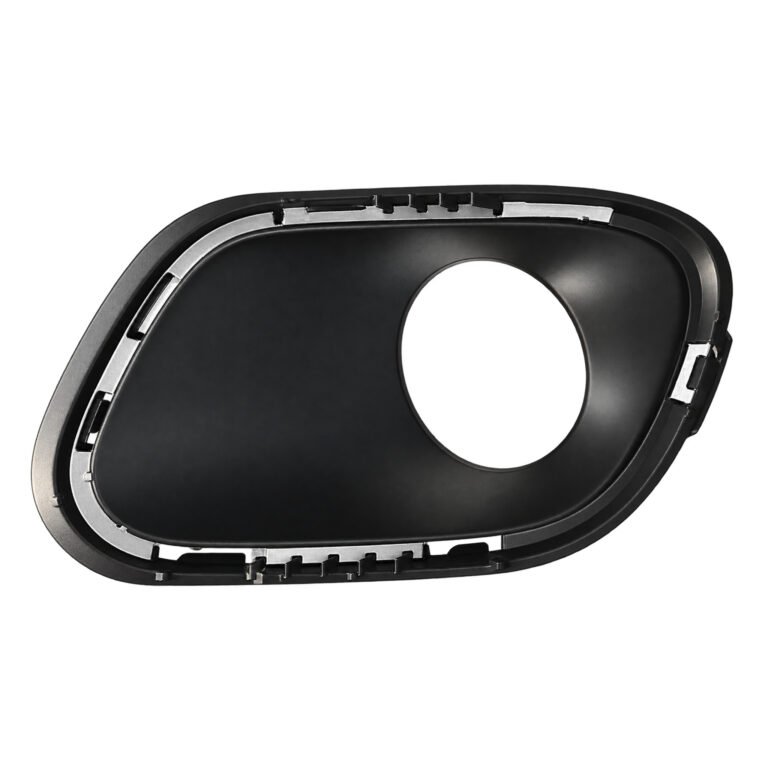 Cherokee fog-light surround with a large offset circular opening and fixing slots around its rounded rim