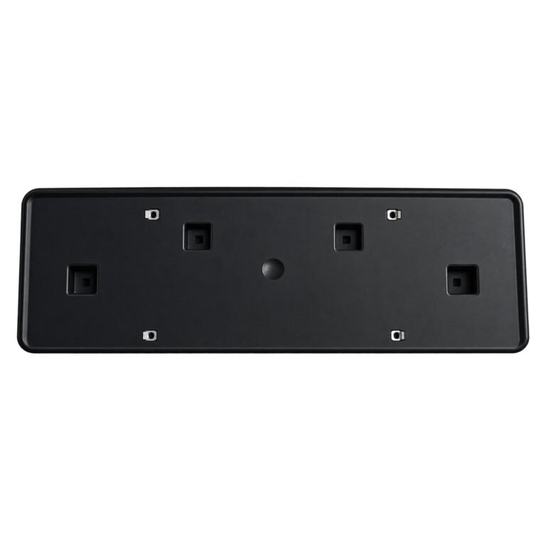 Cherokee rectangular front licence-plate panel with four square recesses and a small central circular recess