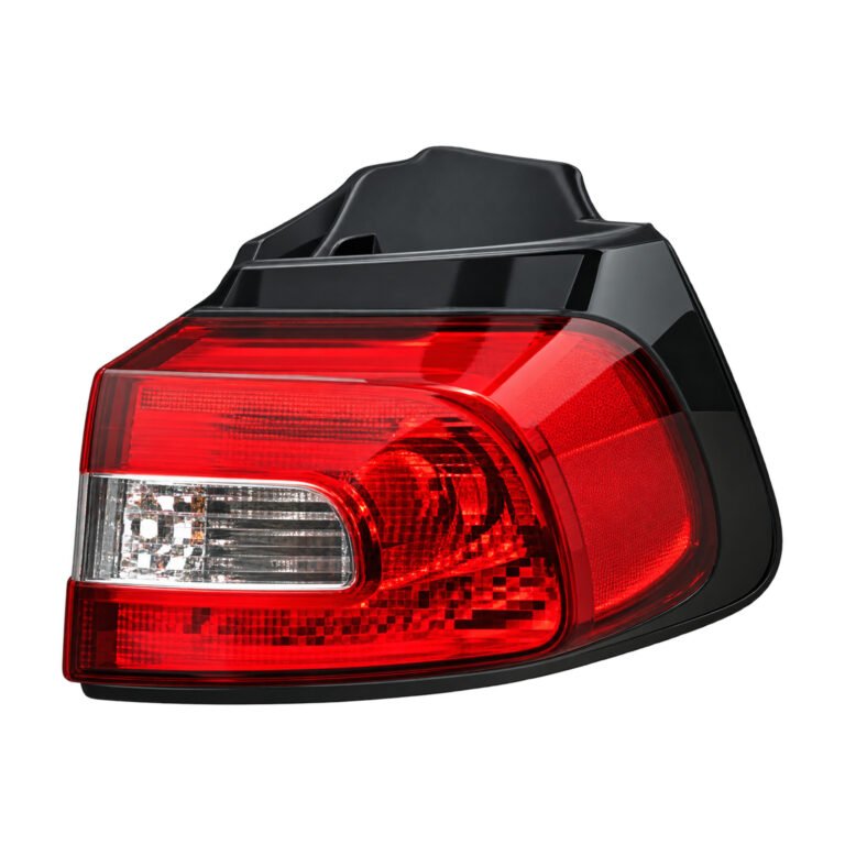 Cherokee outer tail light with a wraparound red lens, clear inset and raised dark upper housing