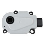 Cherokee radiator shutter motor with four round mounting ears, a dark shaped face opening and a side connector