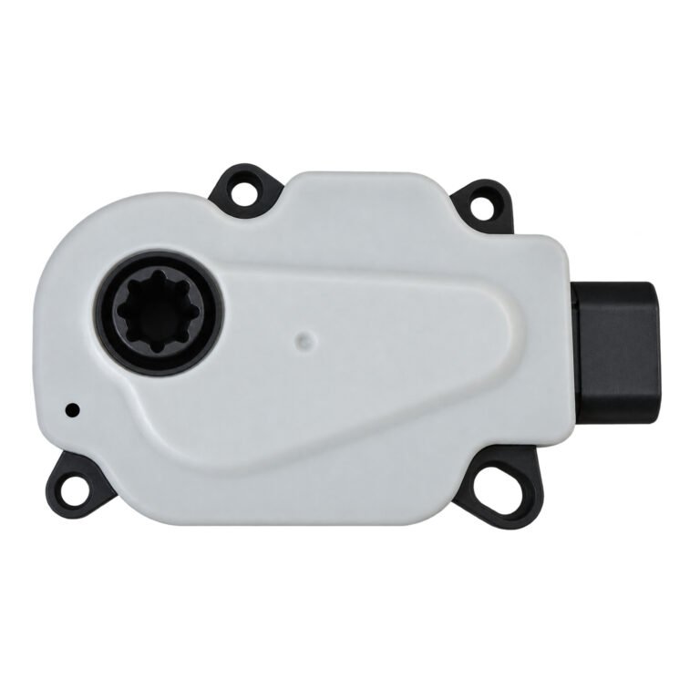 Cherokee radiator shutter motor with four round mounting ears, a dark shaped face opening and a side connector
