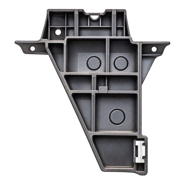 Cherokee radiator support bracket with a tapered ribbed body, side mounting ears and lower attachment detail