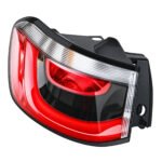 Compass outer tail light with a curved red lens, clear upper border and a projecting dark housing mount