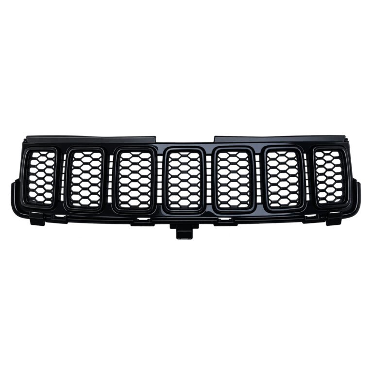 Grand Cherokee WK2 grille with black honeycomb and black surrounds, open slots and a projecting lower centre tab