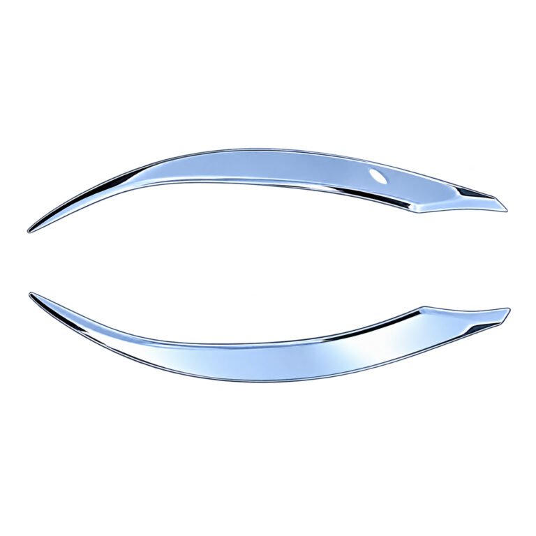 Grand Commander lower headlight mouldings with bright curved faces, broader middle sections and pointed ends