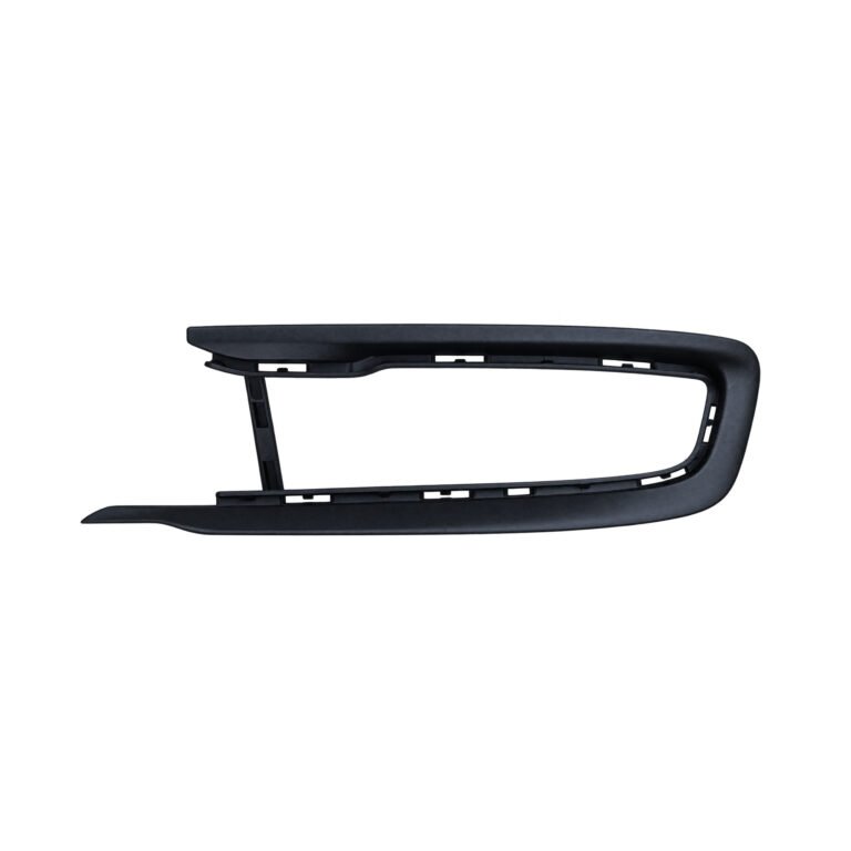 Textured Grand Commander K8 fog light trim with an elongated open frame, rounded end and rectangular inner slots