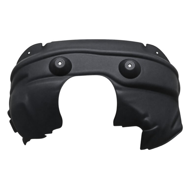 Grand Commander front fender liner with a large cutout, two circular fixing areas and holes along its curved upper flange