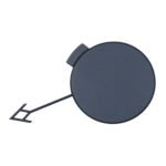 Primed Grand Commander front bumper tow hook cover with a plain round face, edge tab and long retaining arm