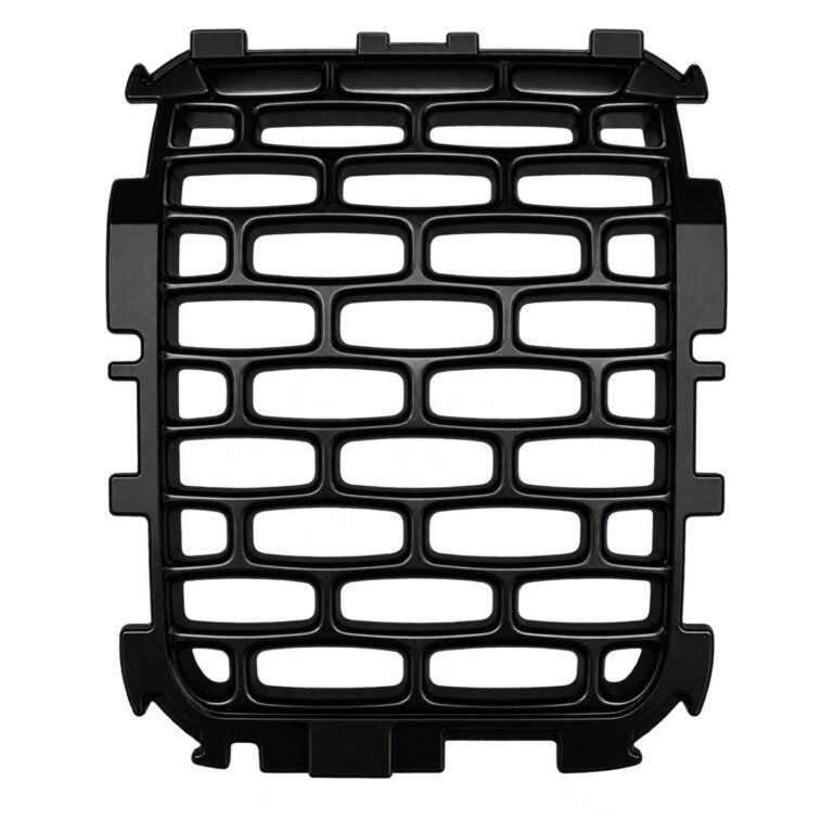 Wagoneer grille mesh insert with uninterrupted staggered openings, a rounded border and projecting top and bottom tabs